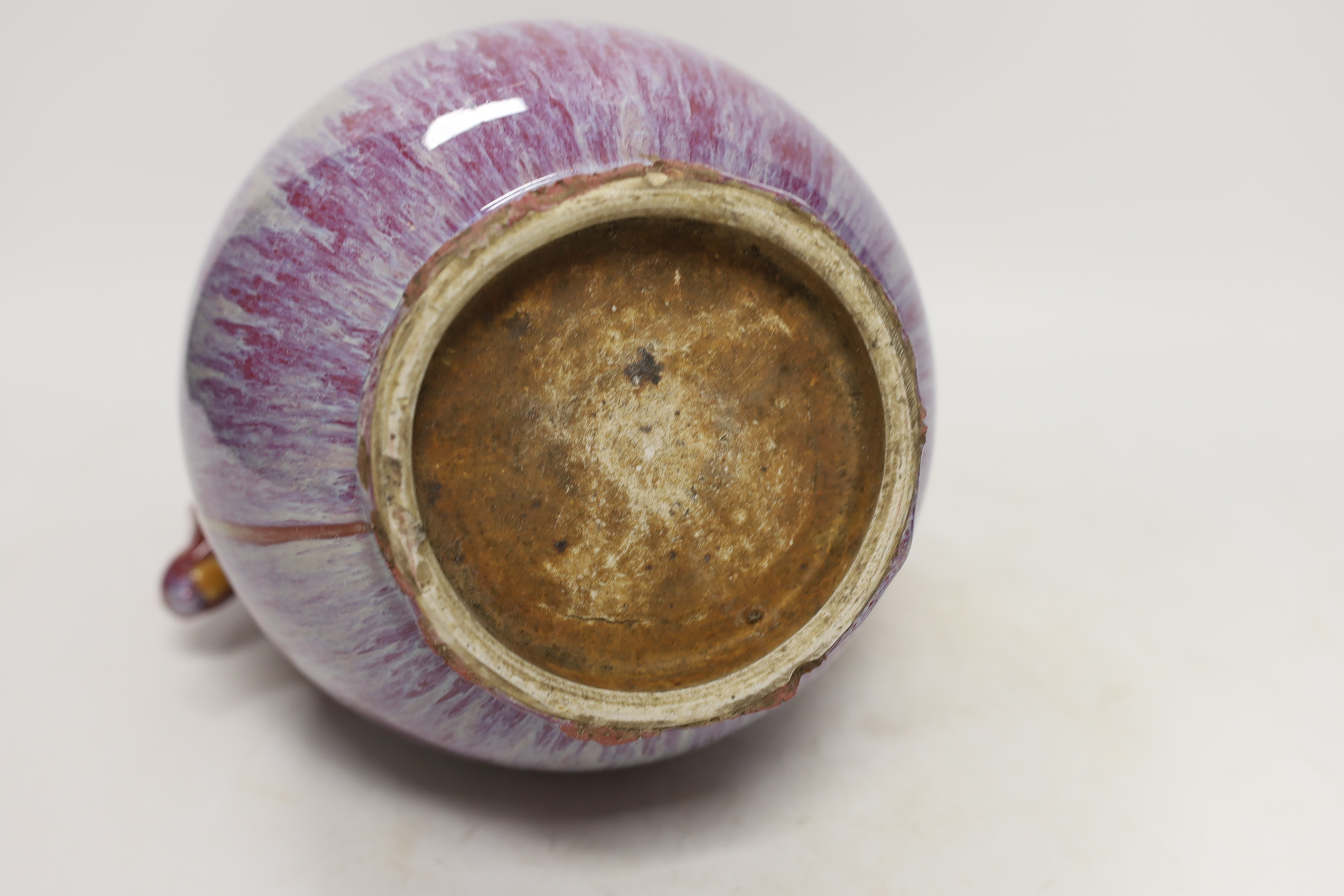 A Chinese sang de boeuf vase, stag head handles, 26cm